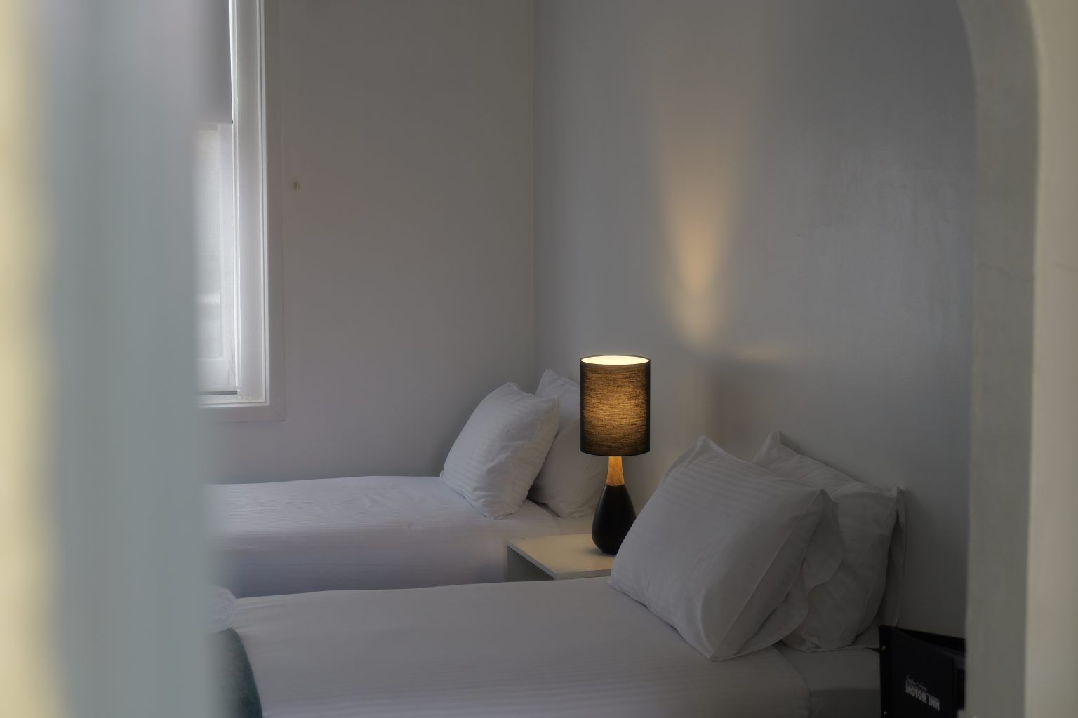 Minimalist twin room at Seaton Arms Motor Inn